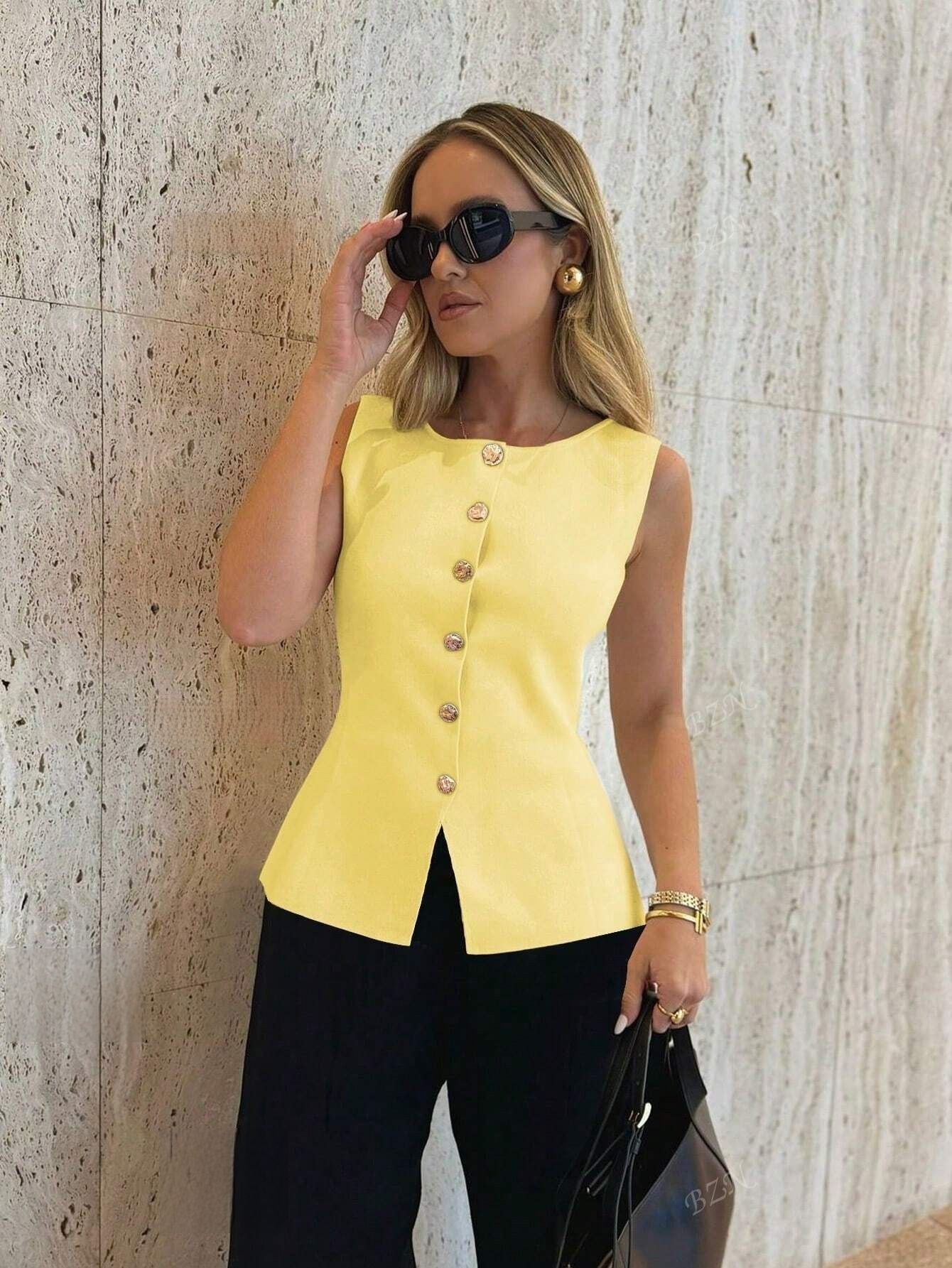 Grier β Sleeveless Button-Down Peplum Top for a chic and trendy look